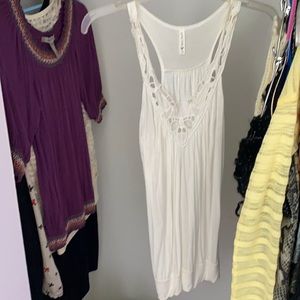 White tank top with cut out floral design on chest